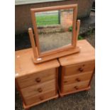 Pair of modern pine three door bedside chests, on turned supports, and a pine free standing dressing