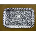 Small Edwardian silver rectangular pin tray repousse decorated with foliage and scrolls, gadrooned