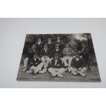 Large postcard of Yorkshire County Cricket Team, black and white photo printed by Delittle,