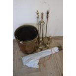 Brass cylindrical coal bin with tin liner on three supports (height 5cm), set of three brass fire