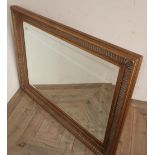 Quality modern rectangular gilt framed beveled edge wall mirror (110cm x 79cm)
