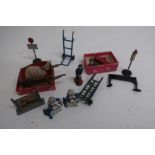 Dinky diecast wheelbarrow, other Hornby and Dinky diecast figures, signs, etc, in one box