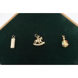 9ct hallmarked gold articulated rocking horse pendant, a similar ingot pendant and an unmarked gem