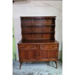 Oak dresser, two height plate rack over two cupboards and two drawers, and a set of four oak