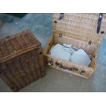 Two wicker picnic baskets, one with contents