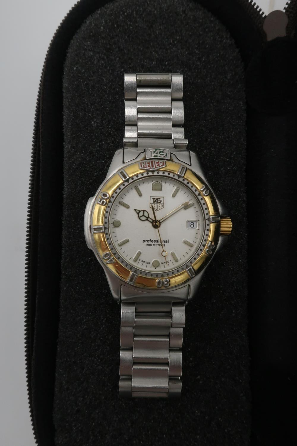 Ladies Tag Heuer professional 200 stainless steel quartz wrist watch, with baton numerals and