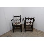 Pair of Ercol Yorkshire armchairs, with carved back and drop in seats on turned supports joined by
