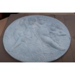 Oval plaster plaque of merry cherubs (70cm x 59cm) (A/F)