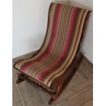 Late Victorian mahogany framed rocking chair, with turned cross supports