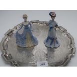 Pair of Coalport figures, Alexandra and Victoria and a EPNS circular tray (31cm) with Chippendale