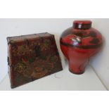 Chinese lacquered style rectangular tapering box, decorated with a dragon, with two metal handles