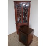 Old Charm carved oak corner cupboard with two upper lead glazed doors above two panelled cupboard