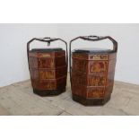 Pair of Chinese lacquered three tier octagonal banquet baskets with wicker bound and metal