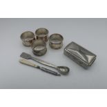 Four early 20th C EPNS napkin rings, EPNS travelling soap container, and a Thomas Kerfoot &