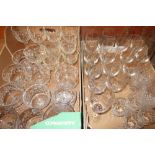 Nine Dartington crystal wine flutes and other glassware, in two boxes