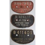Three cast iron wagon plates B887963, B874117 and B411409