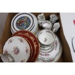 Four pairs of Wedgwood circular plates decorated with gilt foliage on a plum ground, various