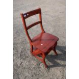 Modern mahogany effect library chair with fold over action
