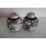 Pair of 20th C Oriental crackleware ginger jars, decorated with warriors and warriors on