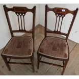 Pair of Edwardian mahogany inlaid chairs, on square tapering supports and upholstered seats (2)