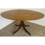 Early 19th C mahogany oval breakfast table, tilt top on vase turned column with four out-splayed