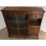 Oak Old Charm side cabinet with two glazed sliding doors, single short drawer above open centre