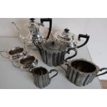 Ashberry EPNS four piece tea service of part lobed form, Victorian EPBM three piece tea service