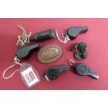 Four Acme composition whistles, two stamped BR two IRS, a NER whistle, a LB & SCR Loco Dept cap