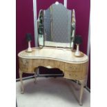Mid 20th C walnut kidney shaped dressing table with triple mirror back, and twin table lamps above