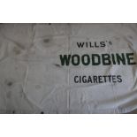 Mid 20th C canvas "Wills's Woodbine Cigarettes" advertising banner, makers stencilled mark on