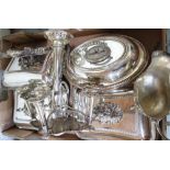 Three matching silver plated entree dishes and covers with gadroon borders, an oval plated entree