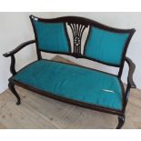 Edwardian mahogany framed two seat settee with upholstered seat (some damage) and two back panels