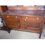 Early 20th C mahogany sideboard with two drawers over two cupboards, blind fretwork decoration