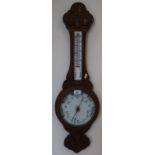 Edwardian golden oak aneroid wheel barometer with detachable box thermometer (lacking