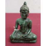 Small Tibetan green patinated bronze model of a seated goddess, with gilt headdress (10cm)