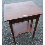 Early 20th C single drawer writing table with square tapering supports, joined by a shaped stretcher