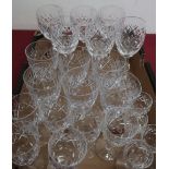 Suite of crystal glassware with star and facet decoration (24)