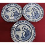 Set of three Chinese export blue & white octagonal plates decorated with a figure and dog in a
