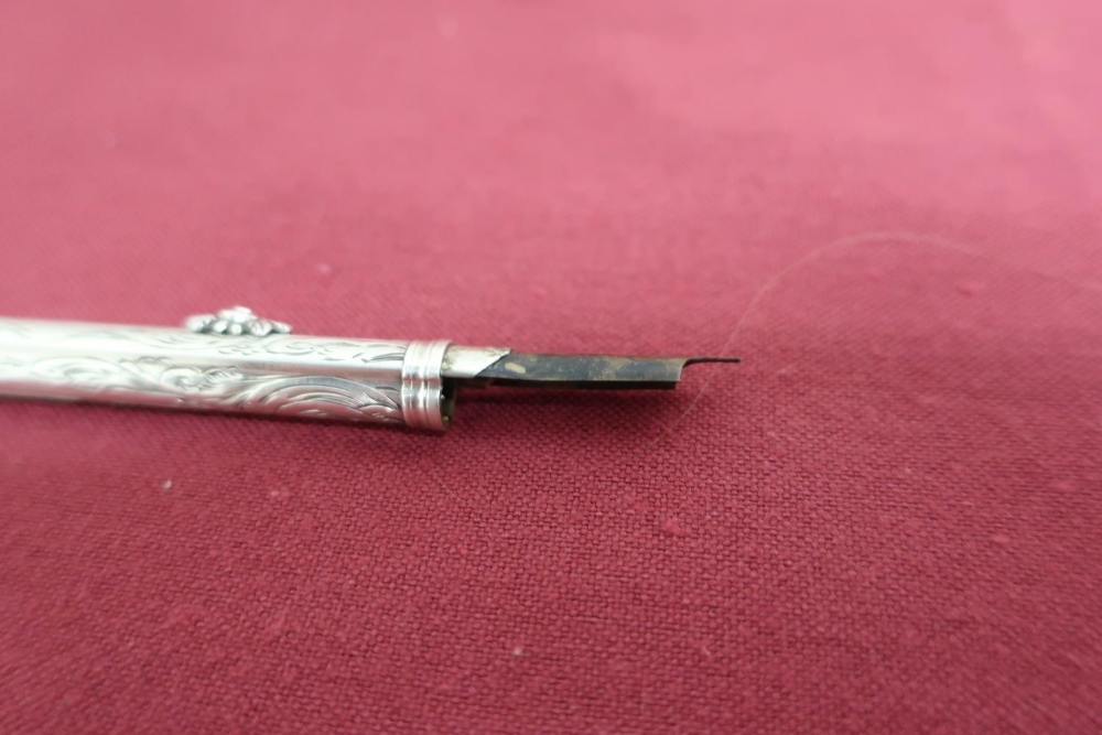 Unmarked silver Edwardian toothpick and pen push, with engraved decoration (length 8cm) - Image 3 of 3