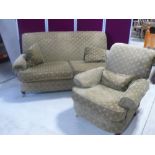 Traditional shape two seat sofa and matching chair upholstered in green geometric fabric (2)