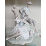 Lladro porcelain group of lovers eating grapes, on naturalistic base with a dog (H27cm)