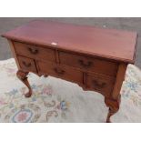 Craftsman made lowboy with molded and pegged top above two long and three short cockbeaded