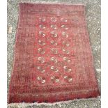 20th C Caucasian traditional pattern red ground rug (130cm x 90cm)