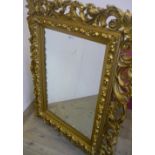 Rectangular wall mirror, in pierced scrollwork gilt frame (15cm x 8cm)