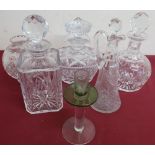 Three crystal decanters, a crystal oil bottle and a candlestick with storm shade (6)