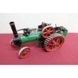 Live steam model of a traction engine, probably scratch built, black and green body with red