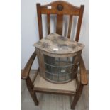 Edwardian oak elbow chair, top rail initialled TS, solid seat on square tapered supports, and a