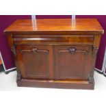 Victorian mahogany chiffonier base, with single frieze drawer, above two carved and panelled