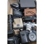 Box of various cameras including Polaroid land camera, Zenith 122, Fuji Instax 100, Aires Reflex 35,