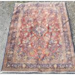 20th C Belgian Samarkand wool rust ground rug, with central medallion, floral ground and floral